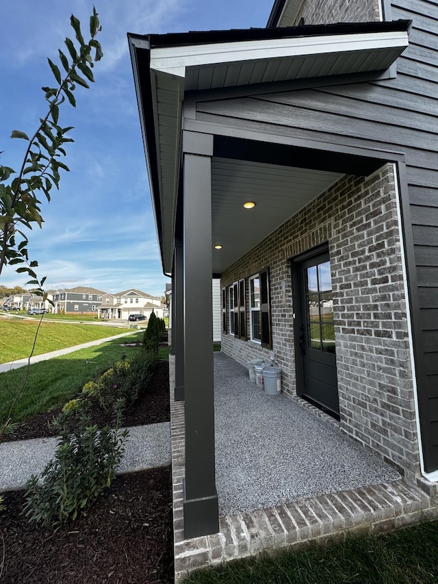 view of home's exterior featuring a porch