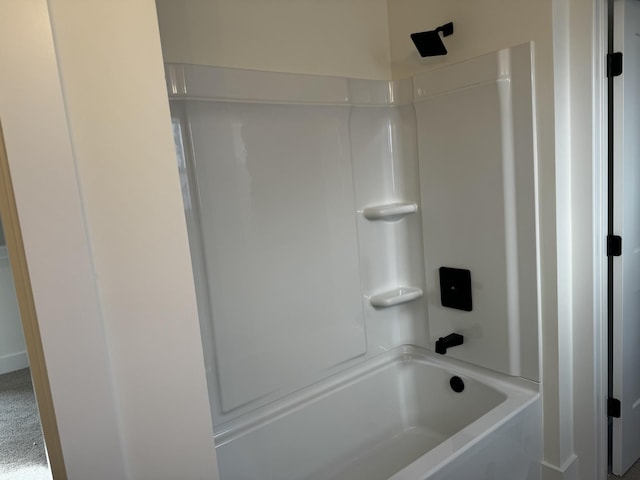 bathroom with shower / tub combination