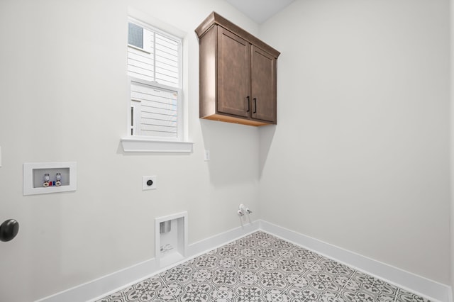 laundry area with washer hookup, hookup for a gas dryer, cabinet space, baseboards, and hookup for an electric dryer