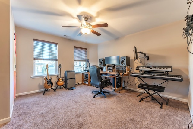 home office with light colored carpet and ceiling fan