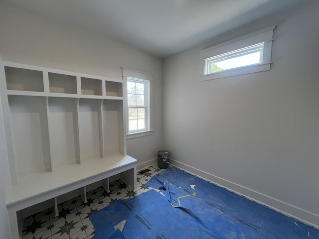 mudroom featuring baseboards and tile patterned floors