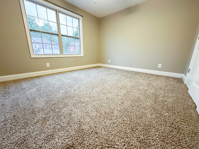 empty room with carpet floors