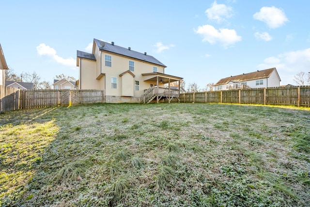 view of yard featuring a wooden deck