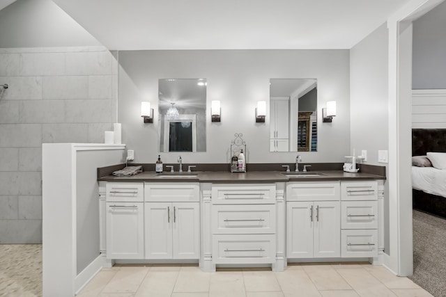 bathroom with vanity and tile patterned floors