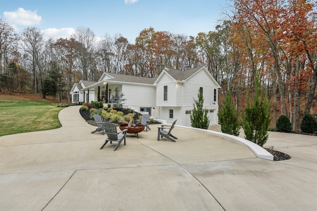 view of side of home featuring a lawn