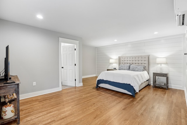 bedroom with light wood-type flooring