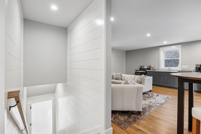 interior space with sink and light wood-type flooring