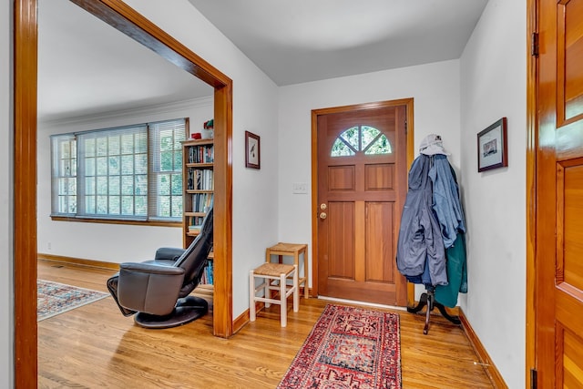 entryway with light hardwood / wood-style flooring