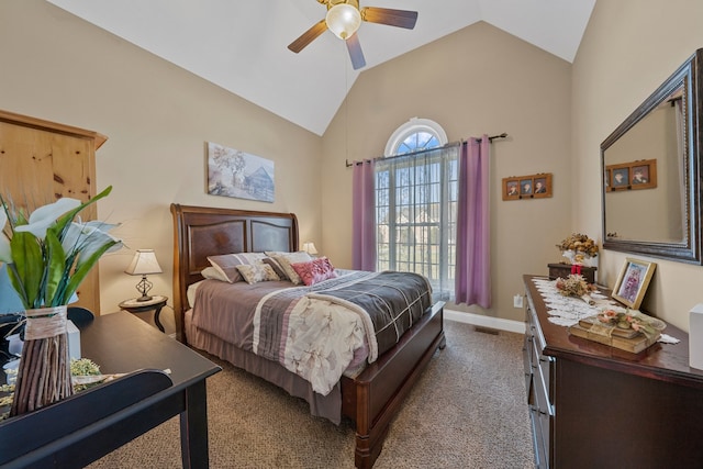 carpeted bedroom with ceiling fan and lofted ceiling