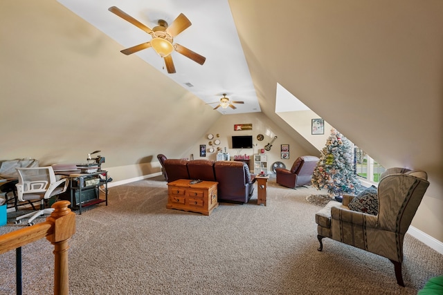 living room featuring carpet, ceiling fan, and vaulted ceiling