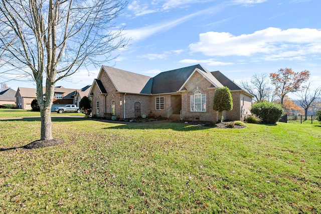 view of home's exterior featuring a lawn