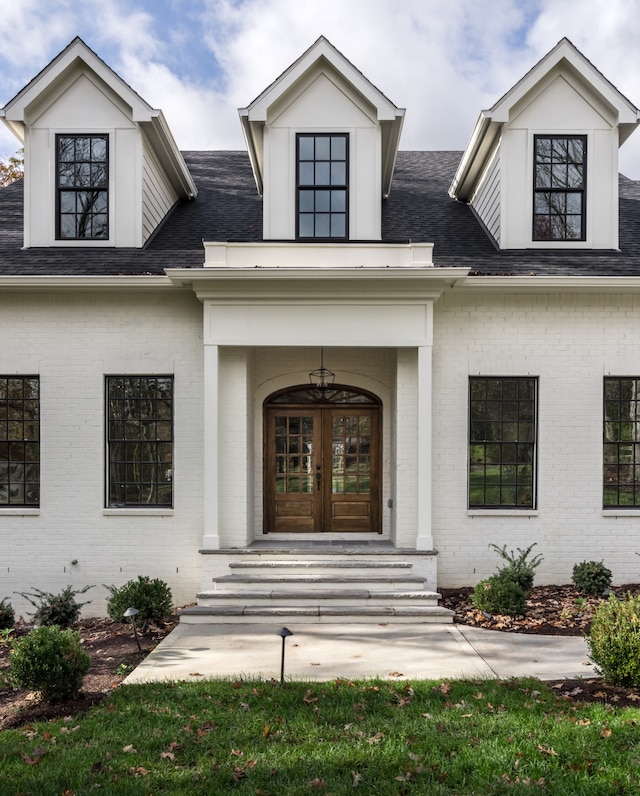 entrance to property featuring french doors