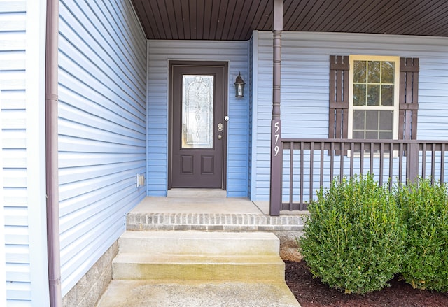 entrance to property with covered porch