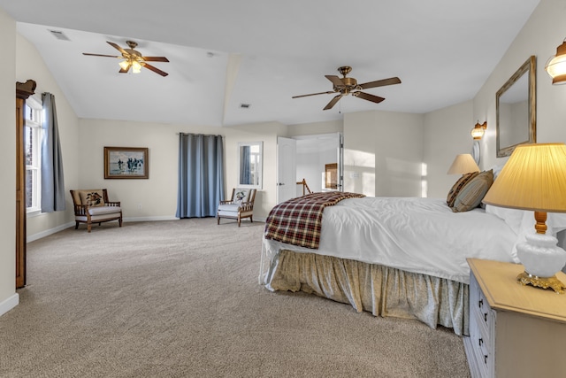 carpeted bedroom with ceiling fan and lofted ceiling