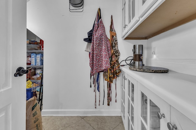 interior space with tile patterned floors