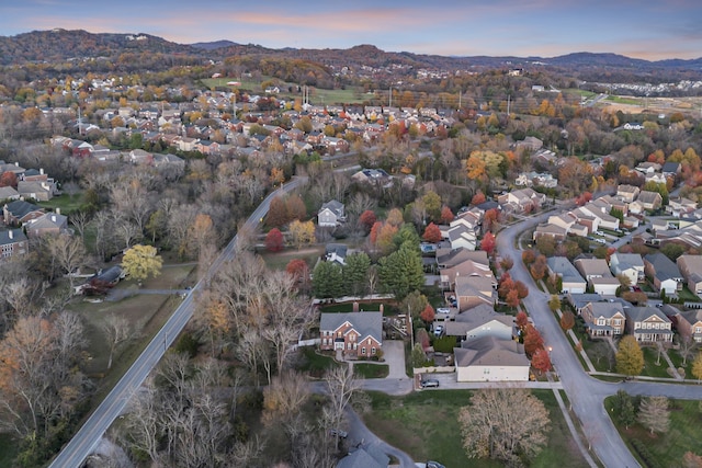 aerial view at dusk with a mountain view