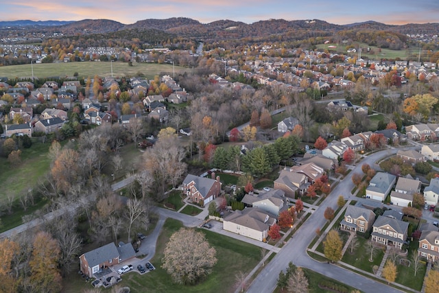 aerial view at dusk with a mountain view