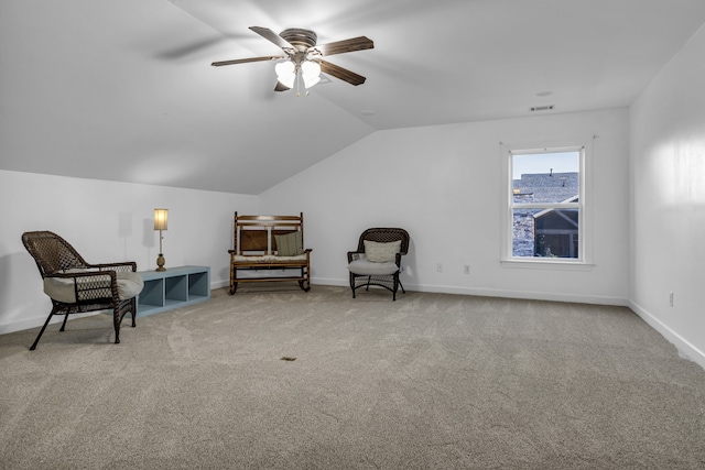 sitting room with light colored carpet, ceiling fan, and lofted ceiling