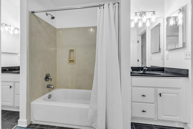 bathroom featuring tile patterned flooring, vanity, and shower / bathtub combination with curtain