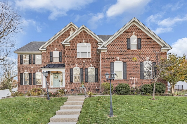 view of front of property featuring a front yard