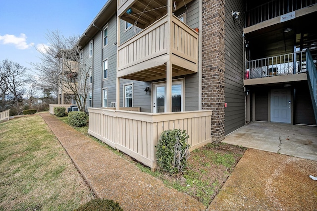 view of property exterior featuring a balcony