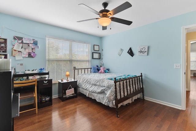 bedroom featuring ceiling fan and dark wood-type flooring