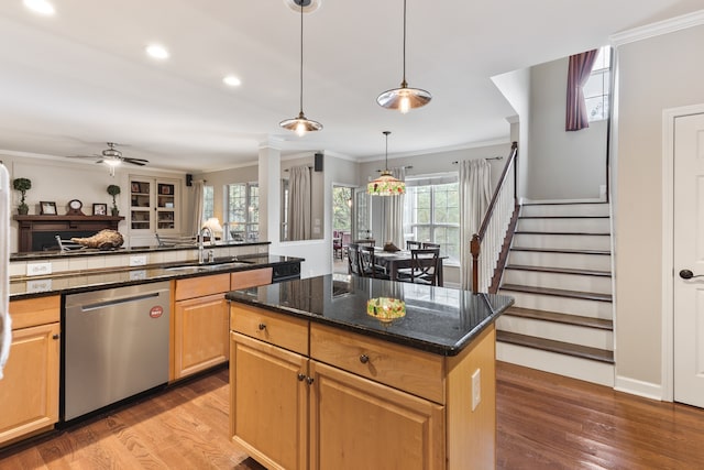 kitchen featuring sink, stainless steel dishwasher, a wealth of natural light, and ceiling fan