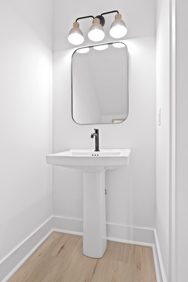 bathroom featuring wood-type flooring