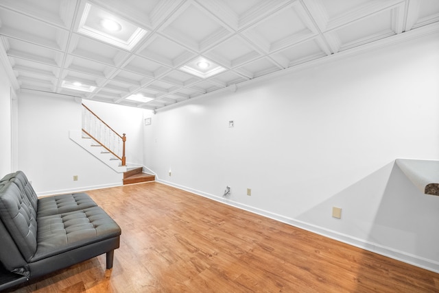 living area with hardwood / wood-style flooring