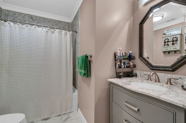 bathroom featuring crown molding, vanity, and toilet