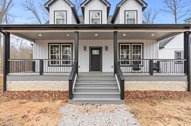 entrance to property with a porch