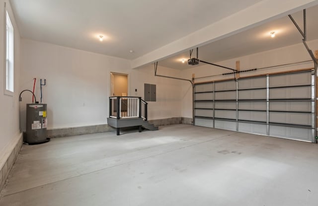 garage with electric water heater, electric panel, and a garage door opener