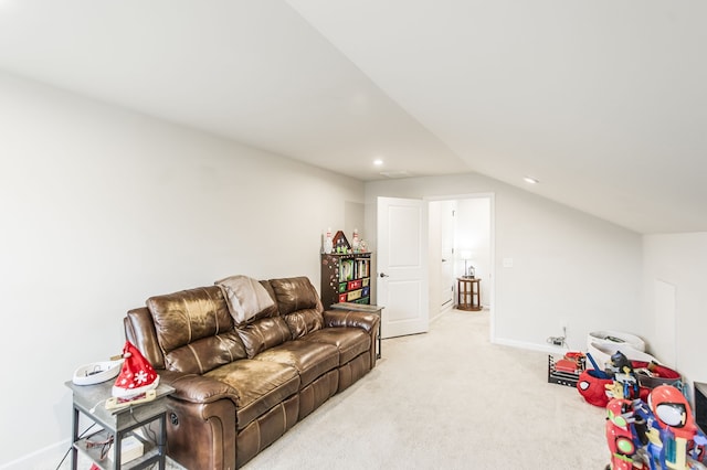 living room featuring light colored carpet and lofted ceiling