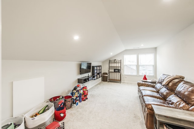 living room featuring light carpet and vaulted ceiling