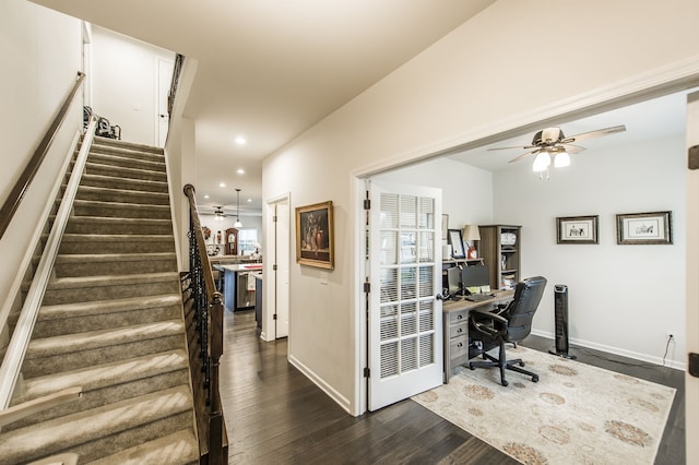 home office featuring ceiling fan and dark wood-type flooring