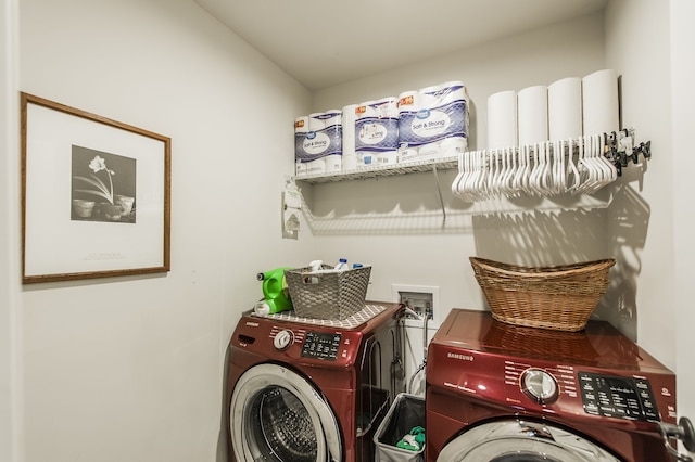 clothes washing area with washer and dryer