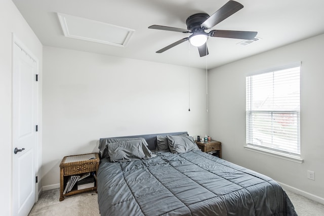 carpeted bedroom with ceiling fan