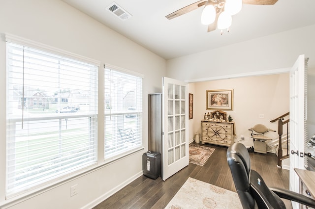 office space with ceiling fan and dark hardwood / wood-style floors