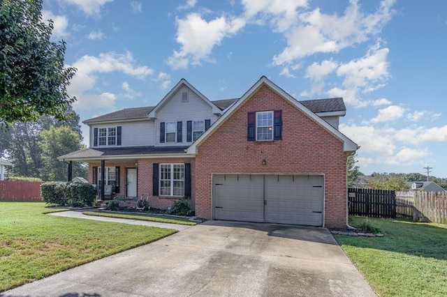 view of front of property with a front lawn and a garage