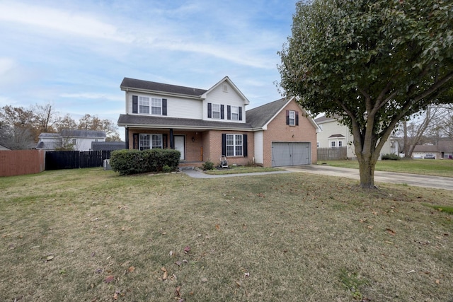 view of front property featuring a garage and a front yard