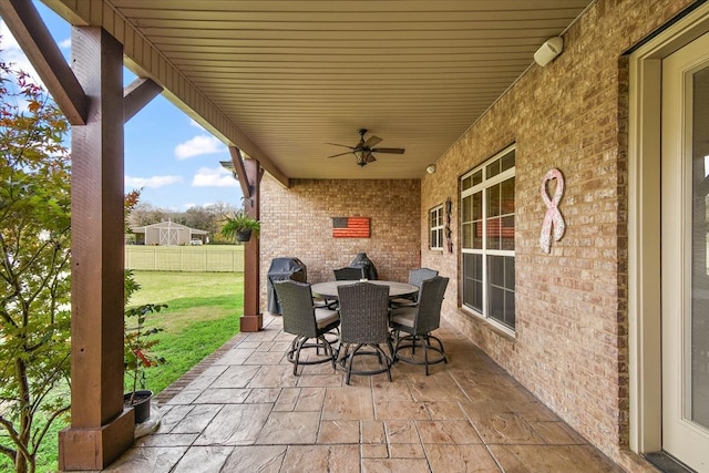 view of patio featuring ceiling fan