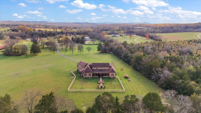 birds eye view of property featuring a rural view