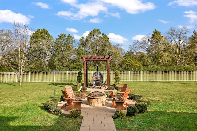 view of yard with a fire pit