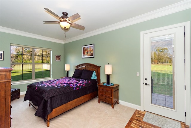 bedroom featuring light wood-type flooring, access to outside, ceiling fan, and ornamental molding