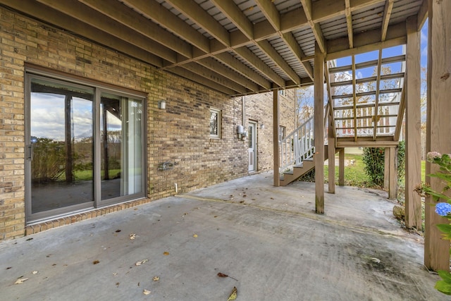 view of patio featuring stairway