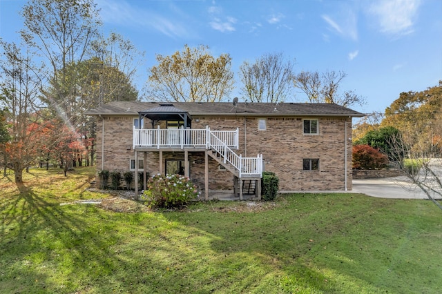 rear view of house with a wooden deck, stairway, a gazebo, a yard, and brick siding