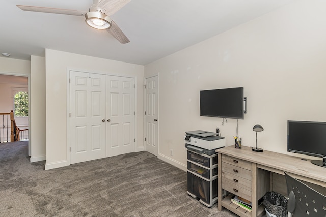 carpeted office space with ceiling fan