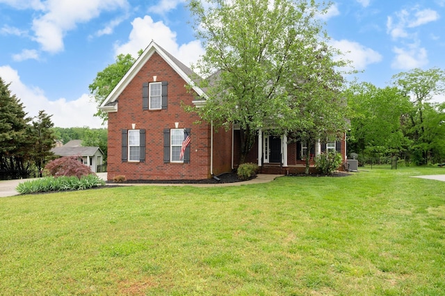 view of front of house with a front lawn