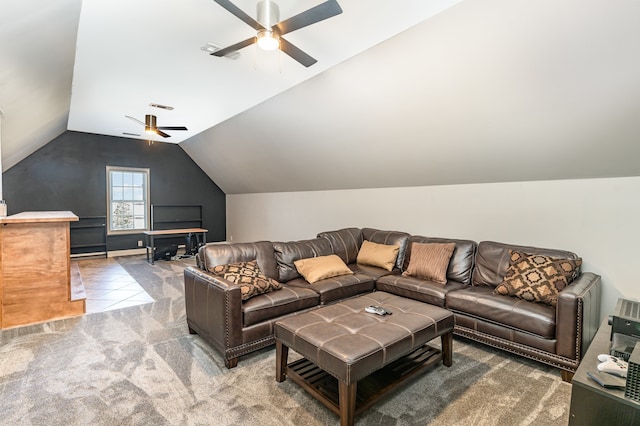 carpeted living room featuring ceiling fan and lofted ceiling