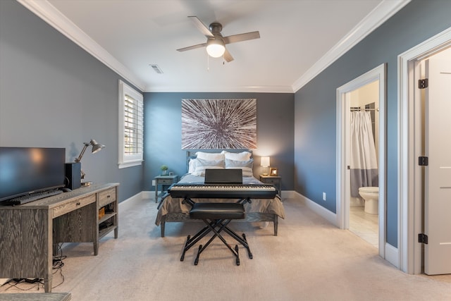 bedroom with light carpet, ensuite bath, ceiling fan, and ornamental molding